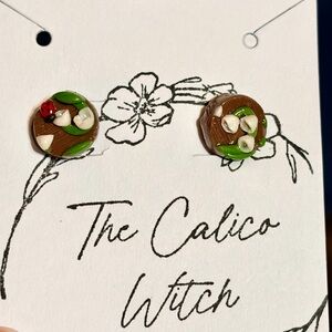 Earrings with a lady bug leaves and flowers